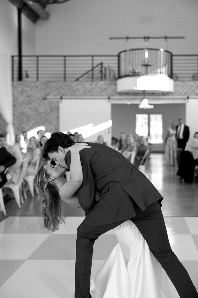Bride and groom sharing their first dance during their wedding reception