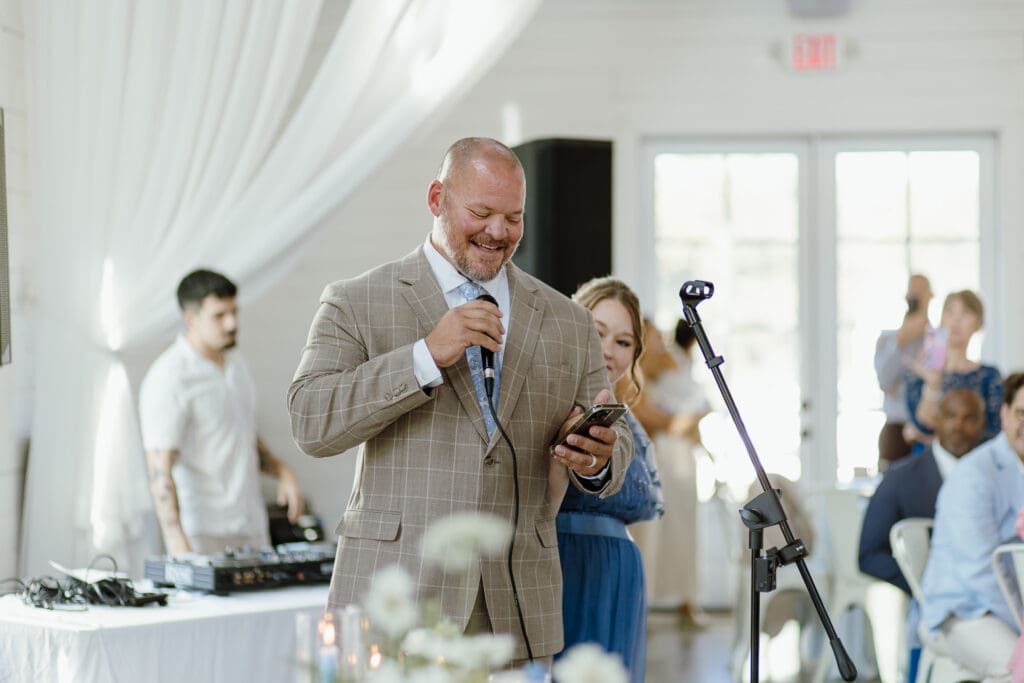 Father of the bride giving a toast during the reception