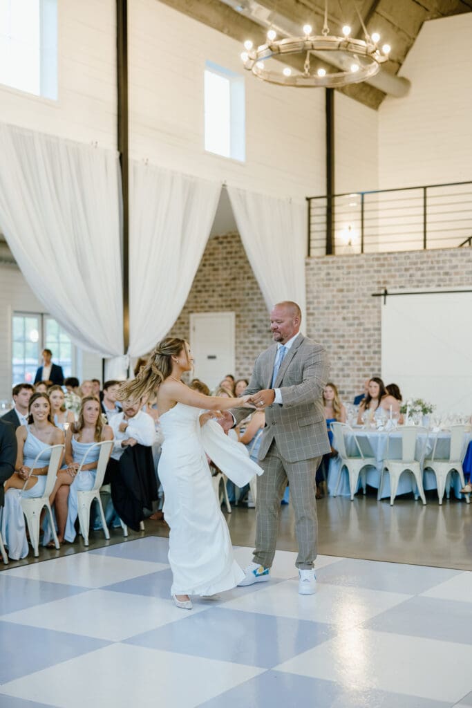 Bride sharing a special dance with her dad during the reception