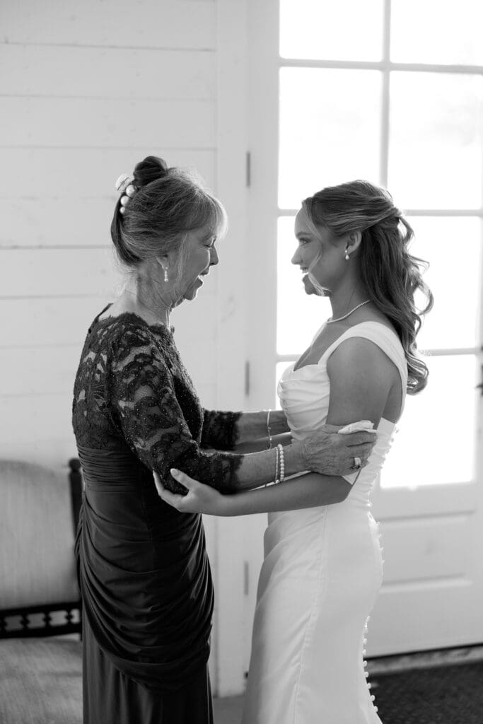 Bride sharing a quiet moment with her grandma before the ceremony